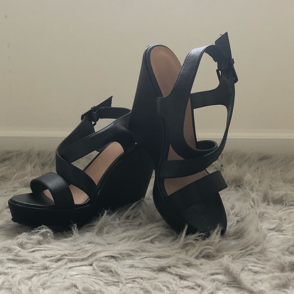 Black faux leather wedges
